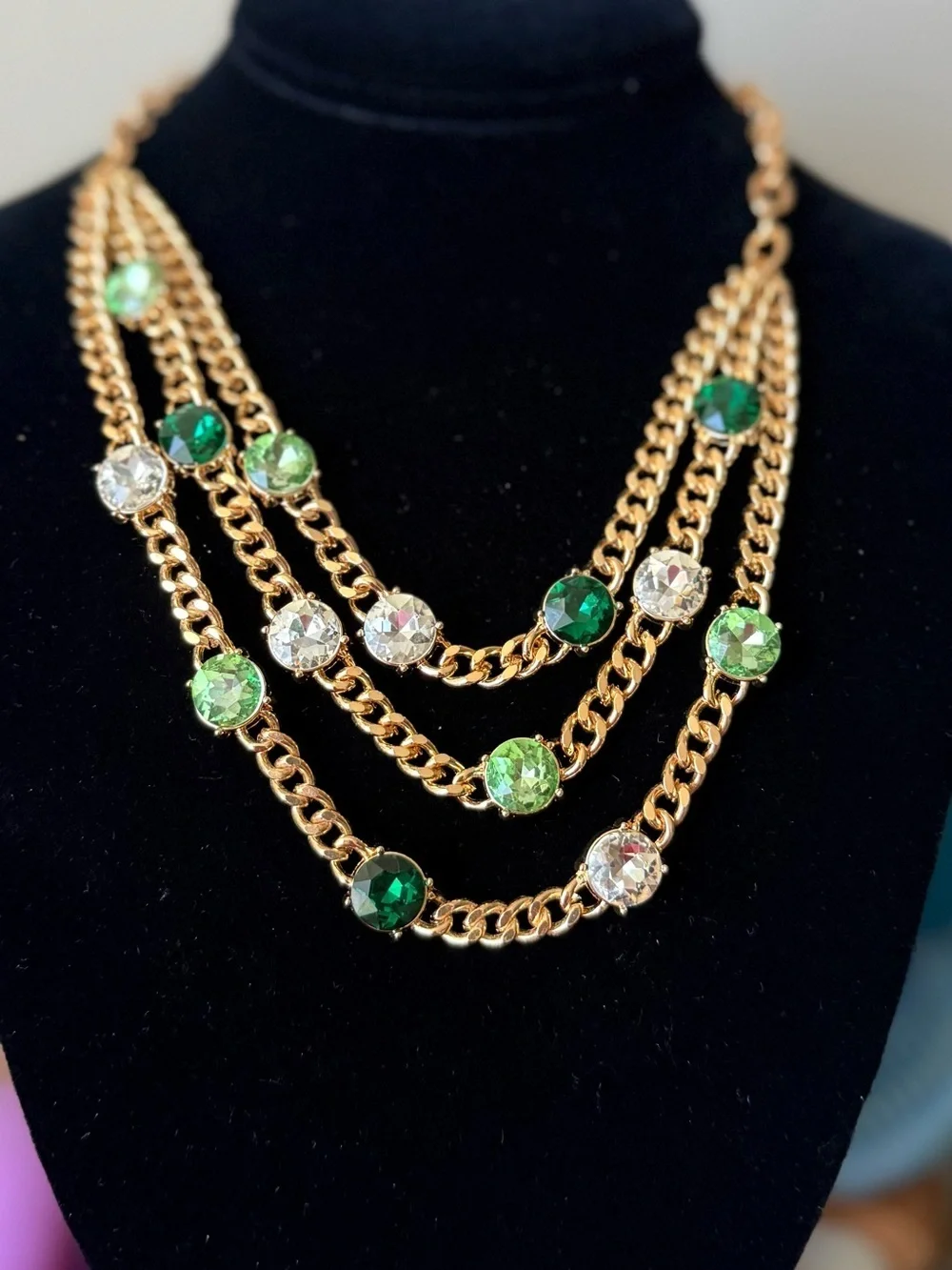 Gold Multi-Strand Necklace with Green and Clear Crystal Accents